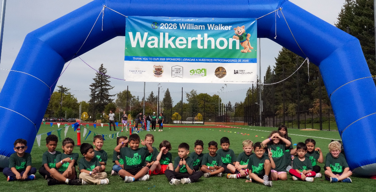 Students and staff gathered under the Walkerthon finish arch